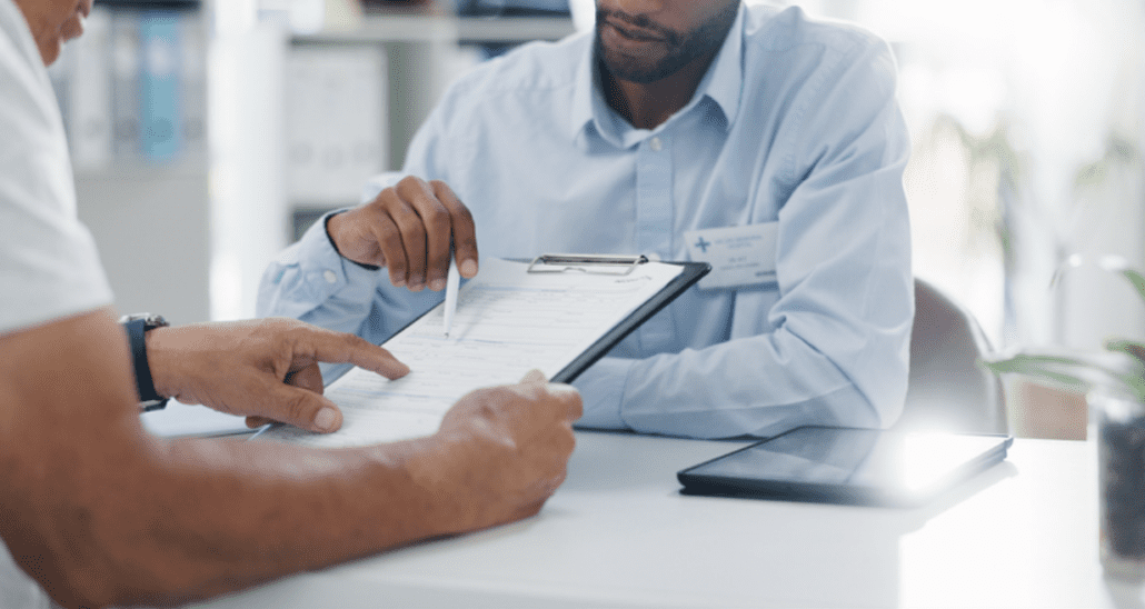 Advisor explaining COBRA health coverage options to a family in Texas