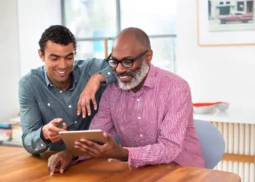 Employees and their families discussing Group Life Insurance options with Medcore Brokerage, the Best Employee Benefits Consultant in Texas, to ensure financial security for their loved ones.