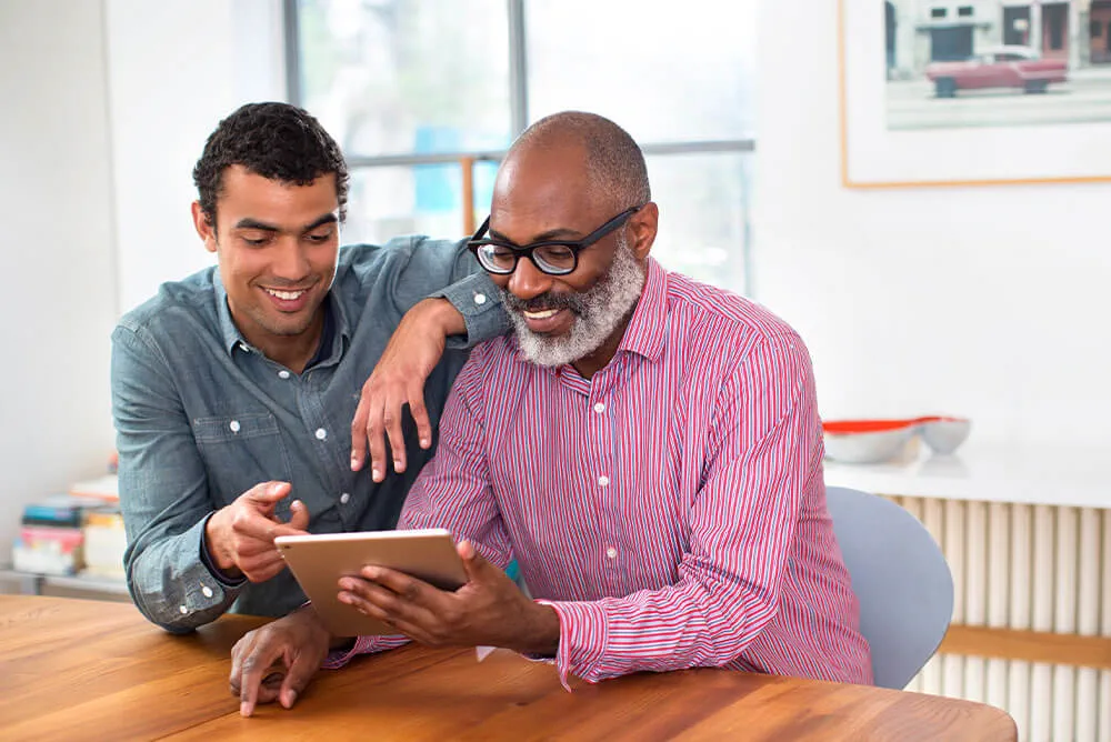 Employees and their families discussing Group Life Insurance options with Medcore Brokerage, the Best Employee Benefits Consultant in Texas, to ensure financial security for their loved ones.