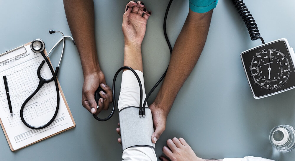 Health Insurance Portability and Accountability Act and Group Health Plans Health Insurance Portability and Accountability Act and Group Health Plans: Key Rules for Employers this image about doctor checking bp of patient