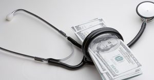 10 03 17 80407780 ITB 560x292 How Cancer Insurance Helps Employees During Treatment? A Stethescope holding money