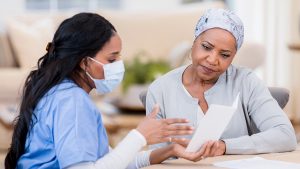 Doctor talking with patient