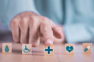 Types of Critical Illness Plans How Much Does Critical Illness Insurance Cost for Employees This image is about man pointing finger on plus icon