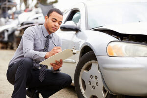 Accident Plansss Beyond Health Insurance: The Critical Role of Accident Plans in Arlington insurance agent recording acccident of car