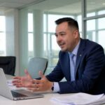 Trey Driver from Medcore Brokerage consulting with a Texas small business client