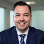 trey driver medcore brokerage group health insurance broker How to Shop for Group Health Insurance the Right Way (Without Wasting Your Time) Trey Driver, employee benefits broker at Medcore Brokerage, smiling in an office, ready to help employers shop for group health insurance